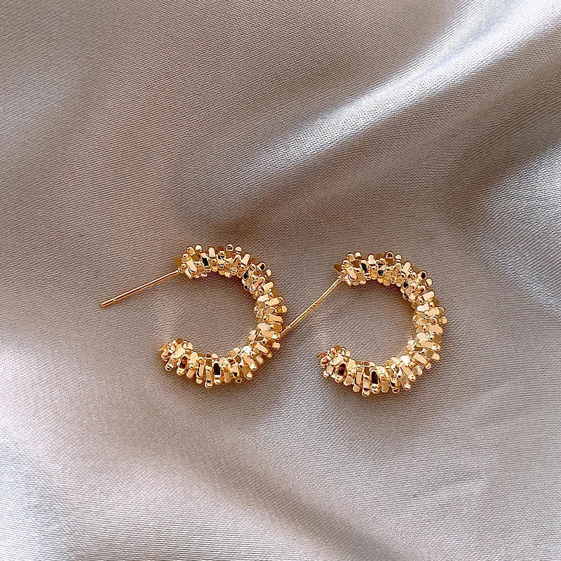 Boucles d'oreilles vintage en forme de vague torsadée