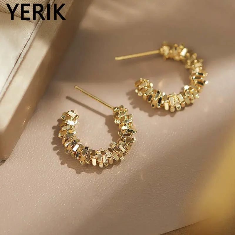 Boucles d'oreilles vintage en forme de vague torsadée